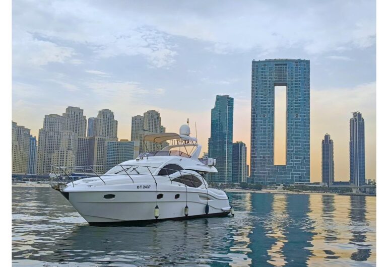 50 ft yacht on the water near JBR skyline, Dubai